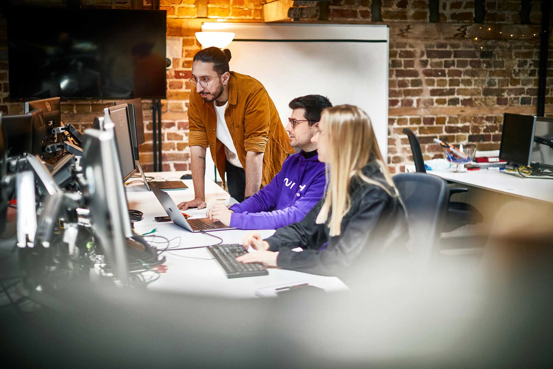 ws_three_employees_london_flipped