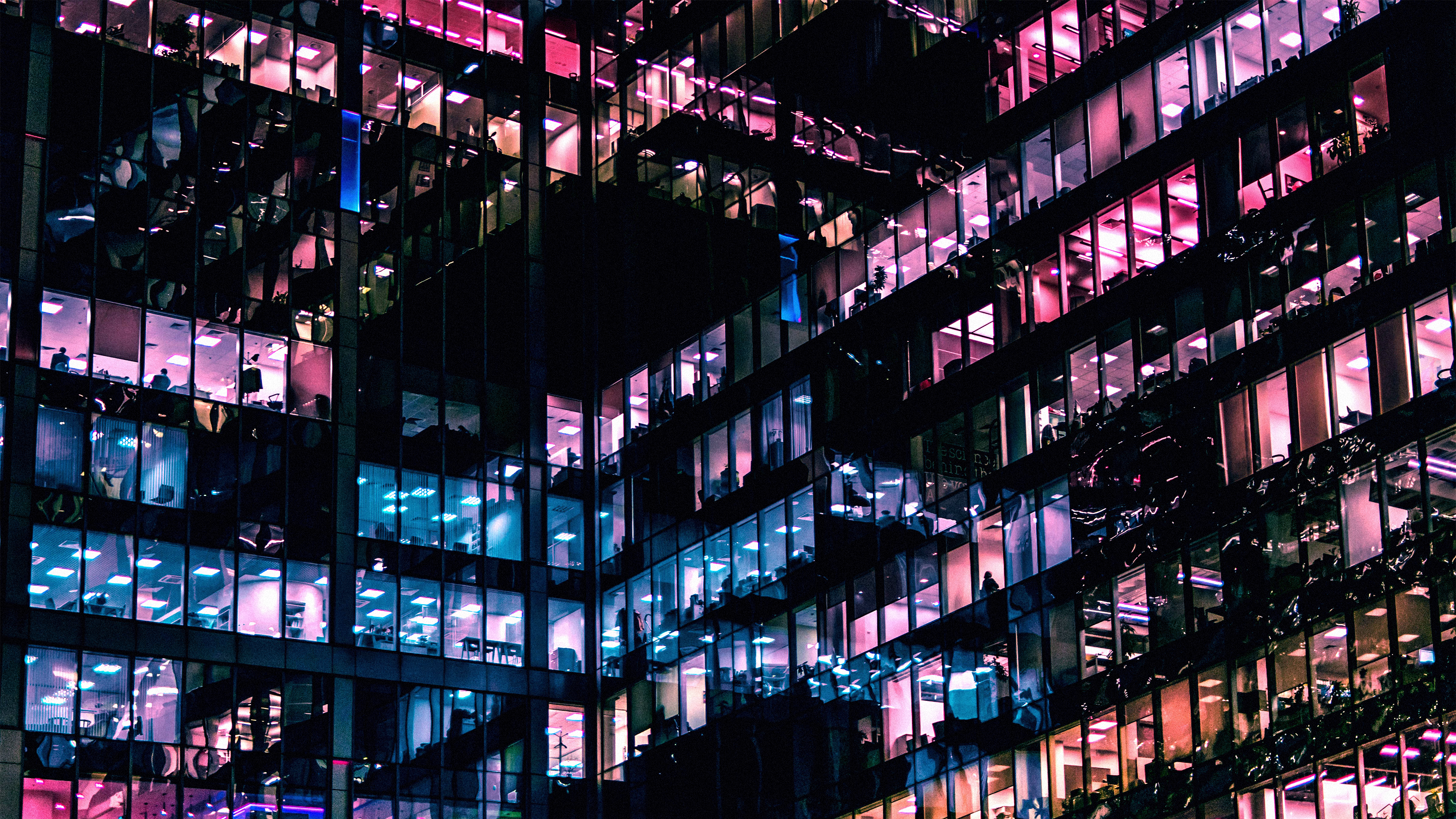 multicoloured lights office windows at night