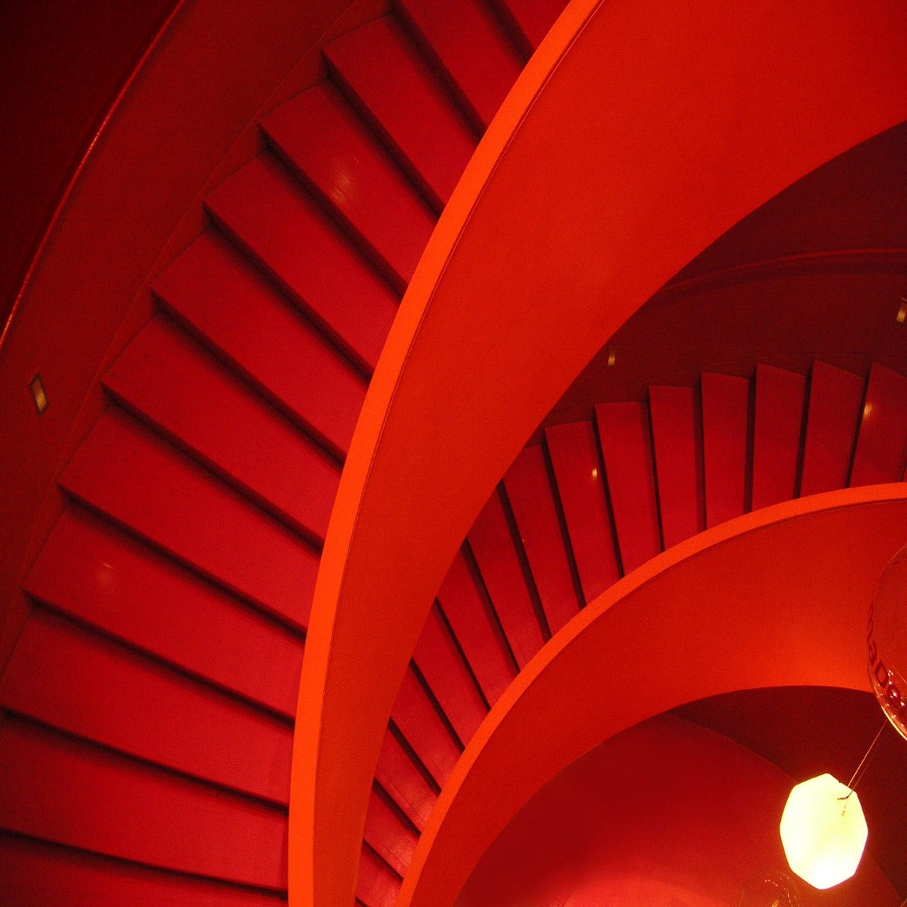 red spiral staircase abstract red spiral staircase abstract